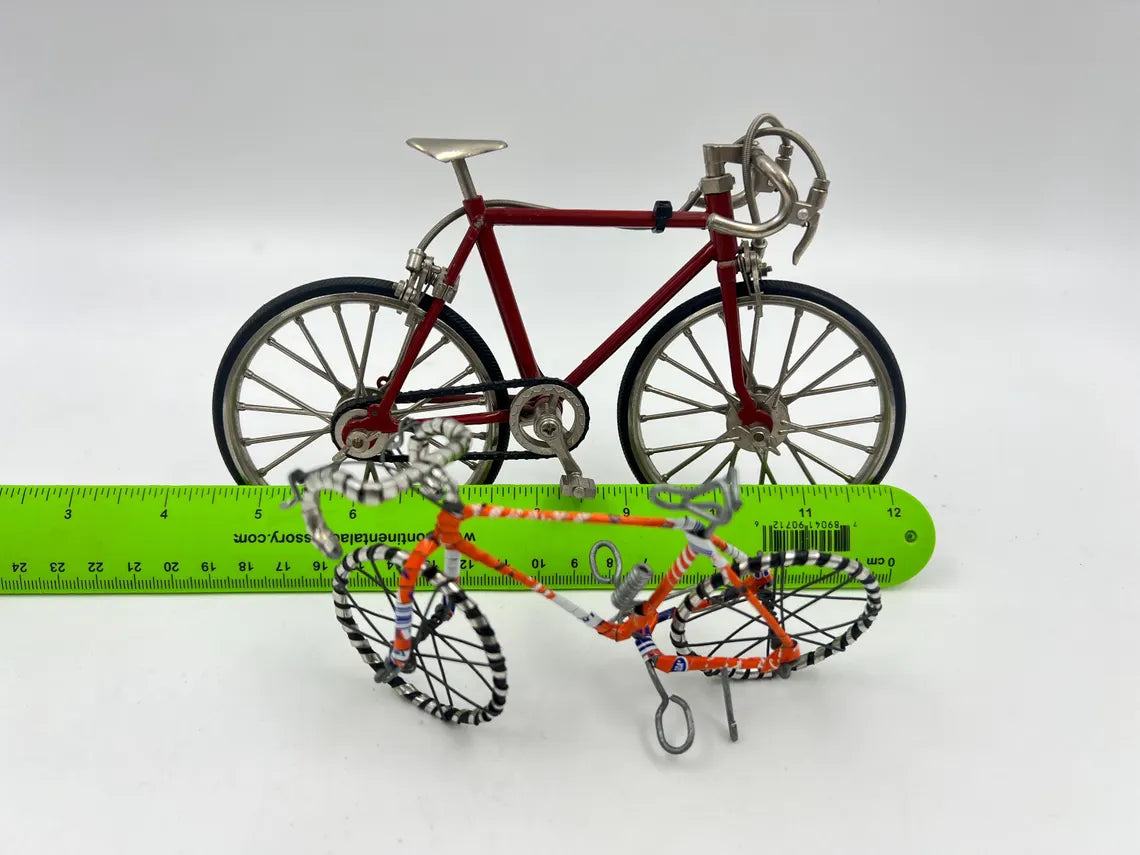 Pair of miniature model racing Bicycles. one Mini"10 Speed" model with rubber wheels and kickstand.