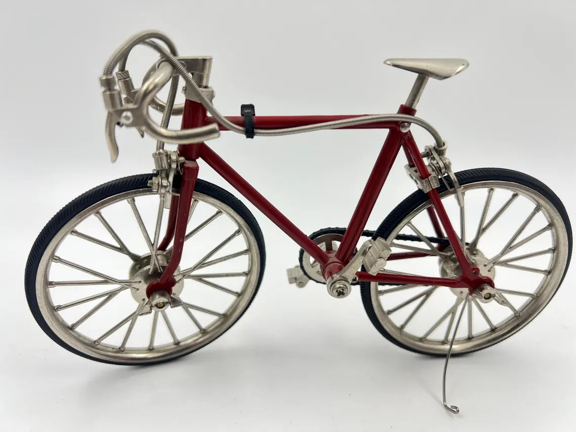 Pair of miniature model racing Bicycles. one Mini"10 Speed" model with rubber wheels and kickstand.