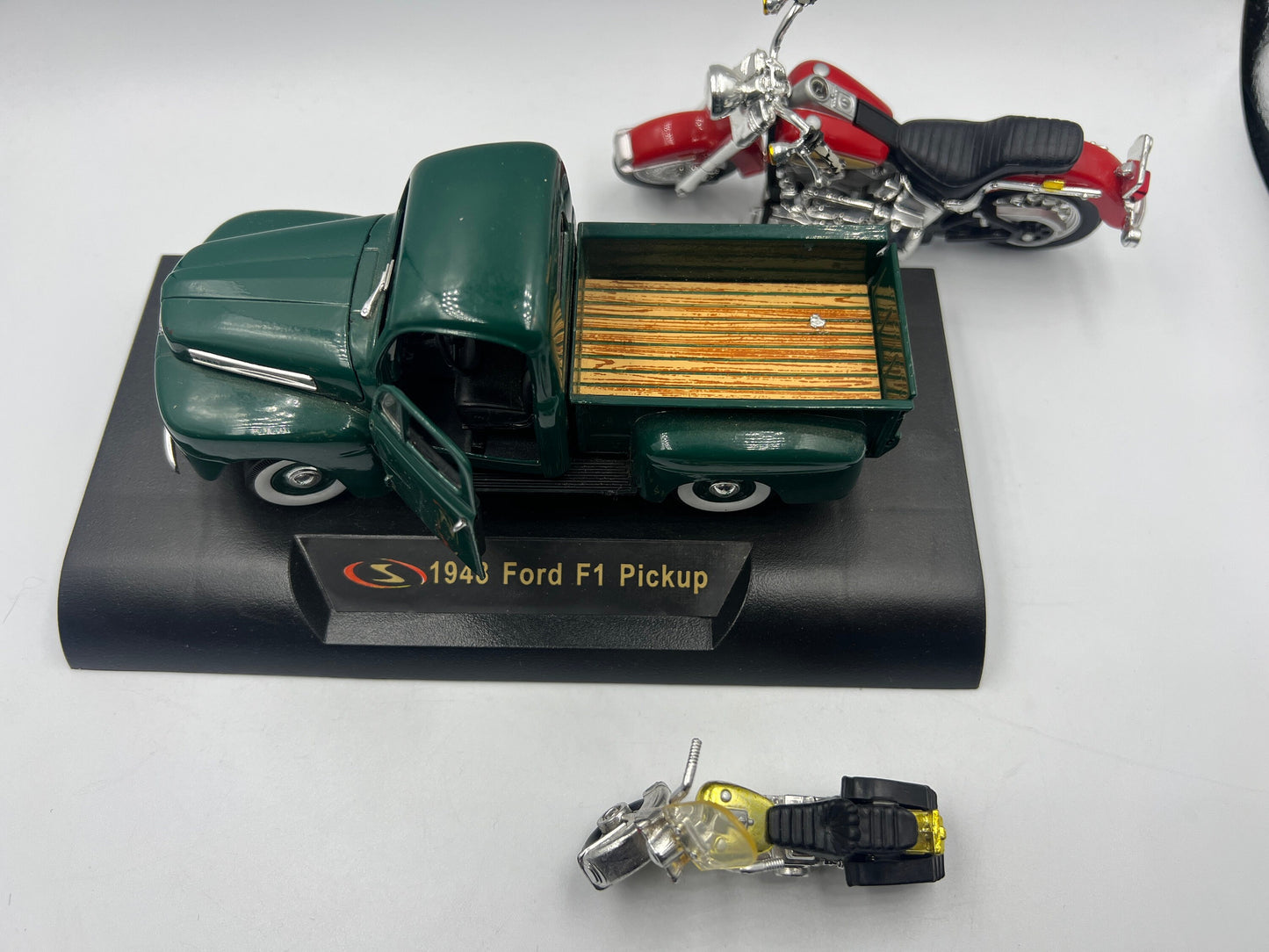 1948 Ford F1 Model Pick Up truck, Harley Davidson Heritage Softtail  1:18 diecast, and Reduced model Harley Davidson Sportster 1 by34