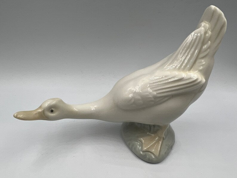 Nao Lladro Vintage Fine Porcelain Goose Duck with Outstretched Neck, Lladro porcelain lying boy angel figurine - Royaltreasuryhouse