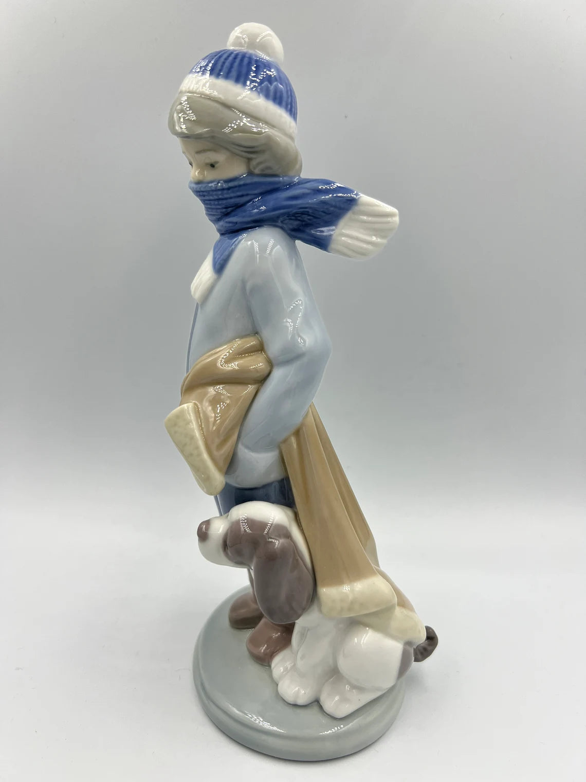 Lladro figurine 5220 - Retired - Winter Boy with scarf, umbrella and Dog - Royaltreasuryhouse