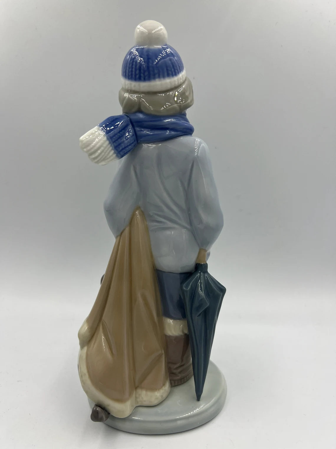 Lladro figurine 5220 - Retired - Winter Boy with scarf, umbrella and Dog - Royaltreasuryhouse