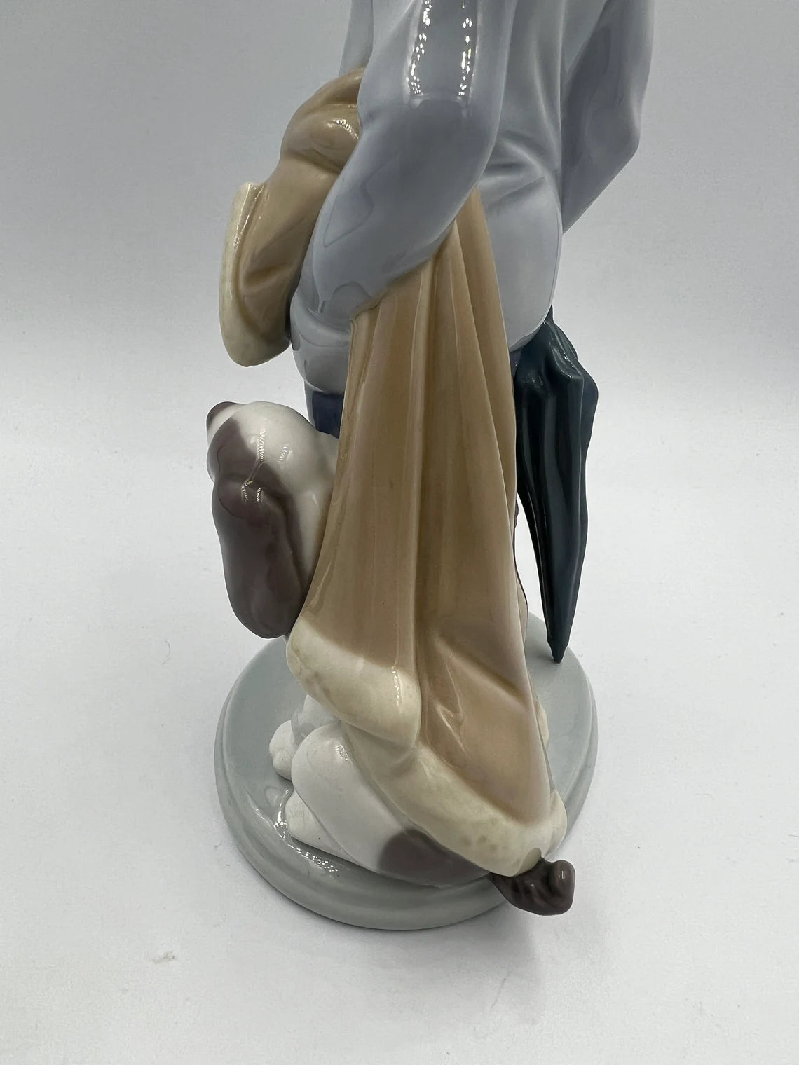 Lladro figurine 5220 - Retired - Winter Boy with scarf, umbrella and Dog - Royaltreasuryhouse