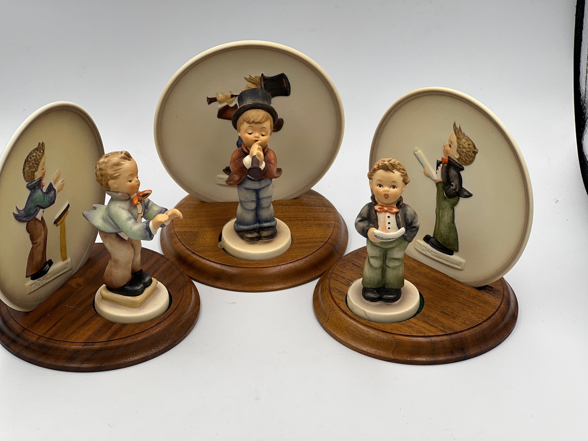 Three sets MJ Hummel "Little Music Maker" Figurines & plates with Stands - Royaltreasuryhouse