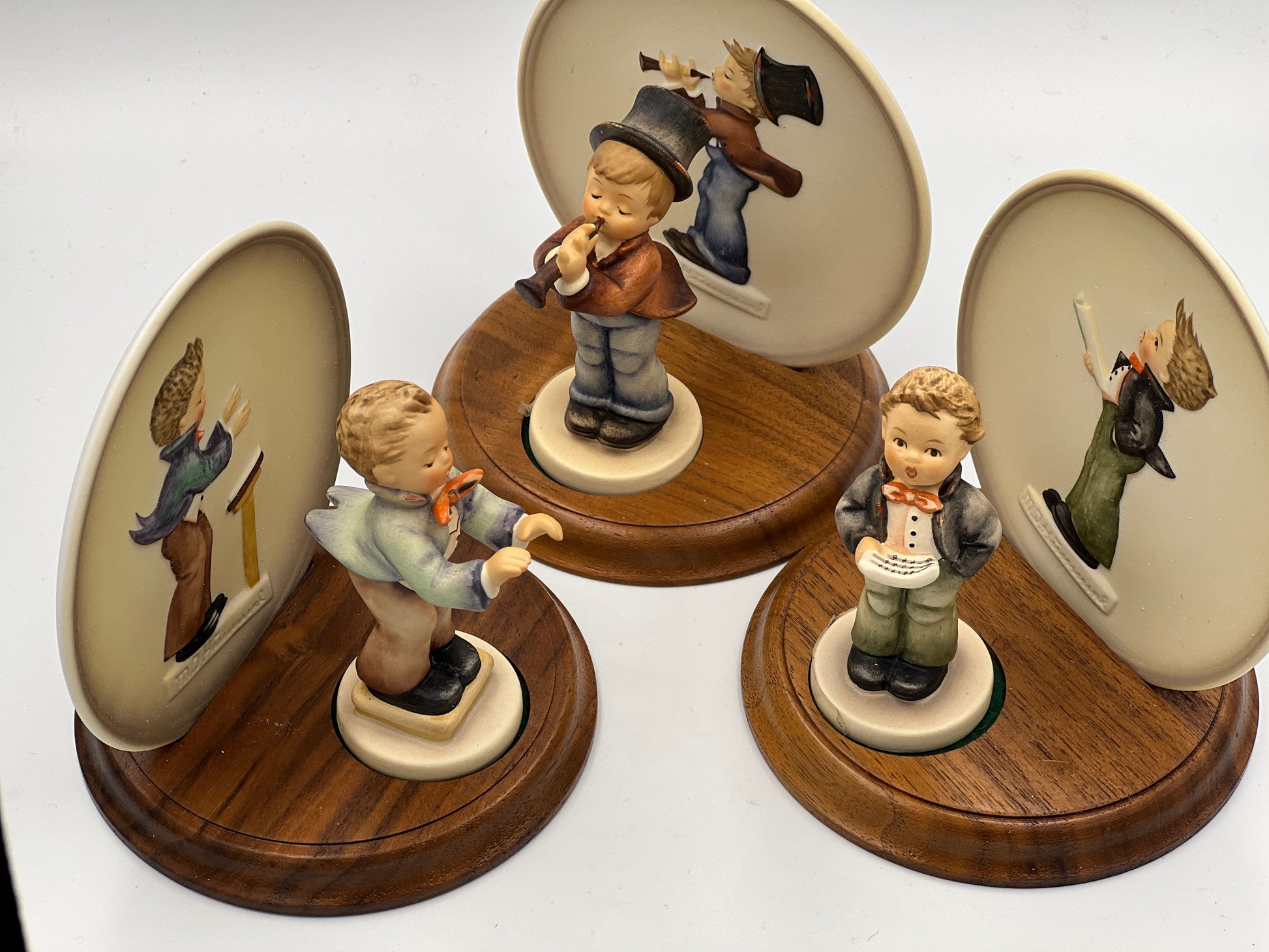 Three sets MJ Hummel "Little Music Maker" Figurines & plates with Stands - Royaltreasuryhouse